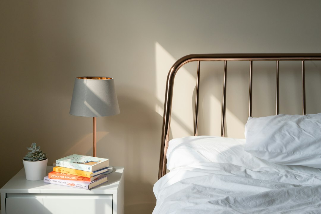Decluttered small bedroom with a clear bedside area