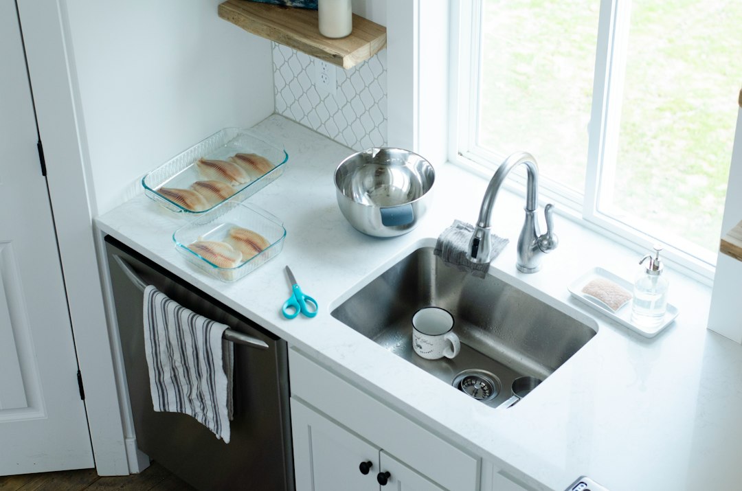 Under sink organization in a compact kitchen