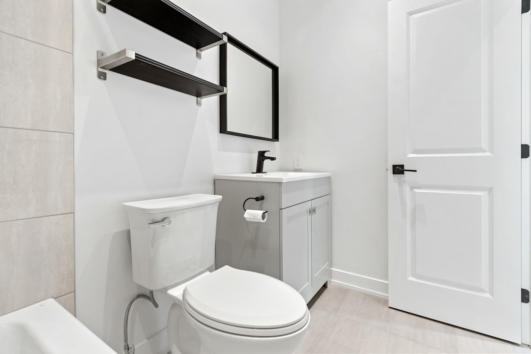 Small bathroom storage with compact fixtures and shelving